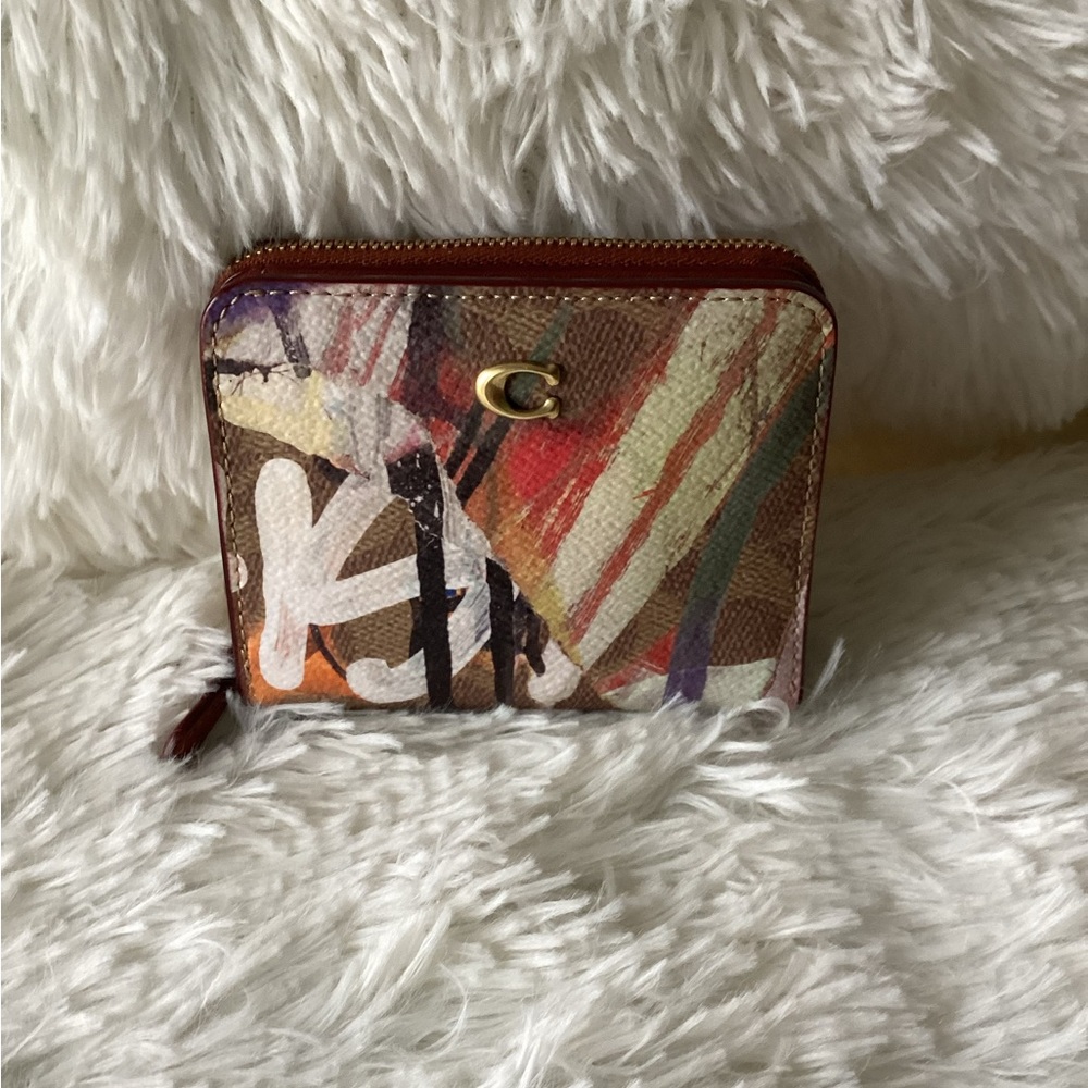 Coach Mint + Serf tan rust multi bifold wallet. Wallet is brand new with tags.